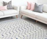 6' X 9' Ivory And Blue Geometric Area Rug