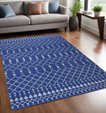 5' X 7' Ivory And Blue Geometric Area Rug