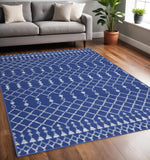 5' X 7' Ivory And Blue Geometric Area Rug