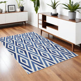 4' X 6' Ivory And Blue Geometric Area Rug