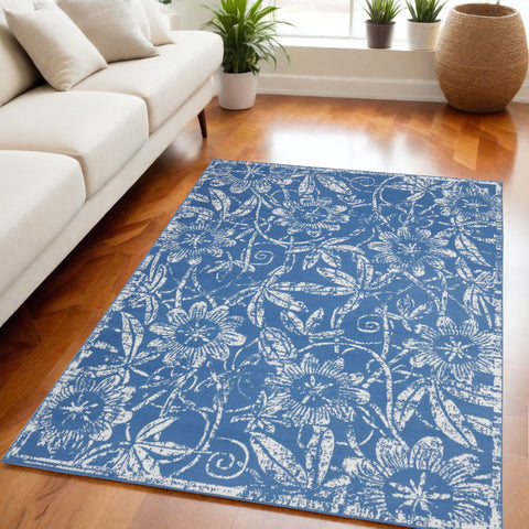 5' X 7' Blue And Ivory Floral Vines Distressed Area Rug