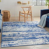 6' X 9' Ivory And Blue Ombre Distressed Area Rug