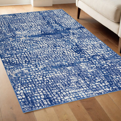 4' X 6' Ivory And Blue Geometric Area Rug