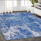 5' X 7' Blue And Ivory Abstract Distressed Area Rug