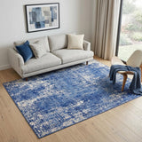 5' X 7' Blue And Ivory Abstract Distressed Area Rug