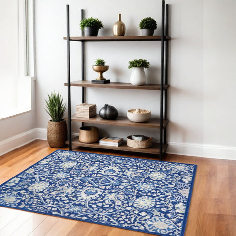 4' X 6' Ivory And Blue Floral Area Rug
