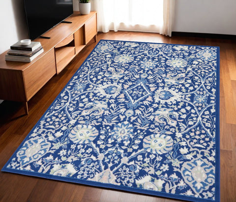 5' X 7' Ivory And Blue Floral Area Rug
