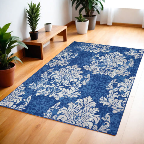 4' X 6' Ivory And Blue Damask Distressed Area Rug