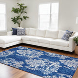 6' X 9' Blue And Ivory Floral Distressed Area Rug