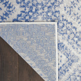 6' X 9' Ivory And Blue Geometric Area Rug