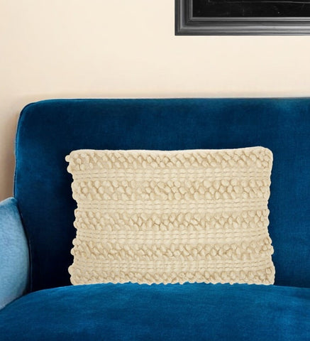 14" X 20" Cream Lumbar Throw Pillow with Pompoms And Texture