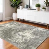 4' X 6' Gray And Ivory Distressed Abstract Area Rug