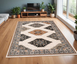 4' X 6' Ivory Black Orange And Gray Geometric Area Rug