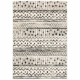 5' X 7' Ivory And Black Abstract Geometric Distressed Area Rug