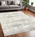5' X 8' Ivory And Gray Abstract Strokes Area Rug