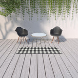 8' Black And Ivory Indoor Outdoor Runner Rug