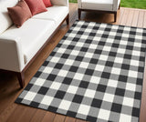4' X 6' Black and Ivory Indoor Outdoor Area Rug