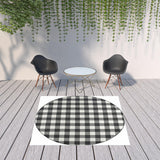 8' X 8' Black And Ivory Round Indoor Outdoor Area Rug