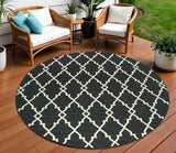 8' X 8' Black And Ivory Round Indoor Outdoor Area Rug