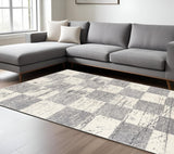 7' X 9' Gray and White Checkered Power Loom Distressed Area Rug