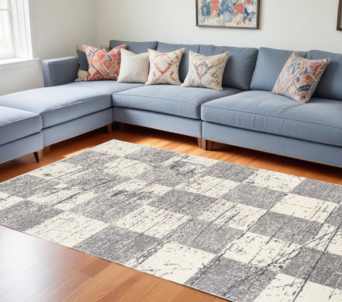 7' X 9' Gray and White Checkered Power Loom Distressed Area Rug