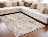 5' X 8' Beige And Ivory Abstract Area Rug