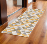 6' Yellow And Ivory Geometric Runner Rug