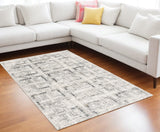 7' X 10' Gray and Ivory Abstract Power Loom Area Rug