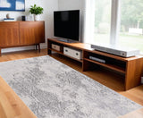 7' X 10' Cream And Gray Tinted Ogee Pattern Area Rug