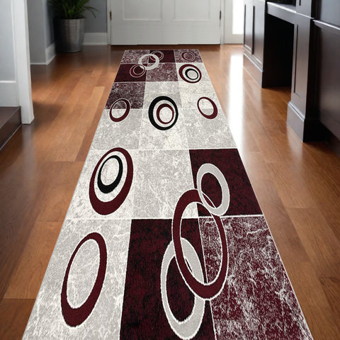 15' Red And White Abstract Runner Rug