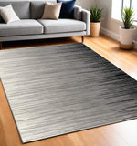5' X 7' Black Abstract Dhurrie Area Rug