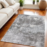 5' X 7' Gray And Ivory Abstract Area Rug