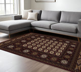 7' X 9' Red and Ivory Floral Medallion Power Loom Area Rug