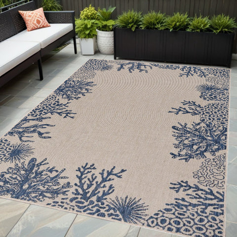 5' X 7' Beige And Blue Coral Indoor Outdoor Area Rug