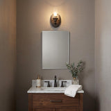 One Light Bronze Wall Light with Clear Glass Shade