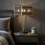 25" Brass Metal Four Light Geometric Table Lamp With Black Drum Shade