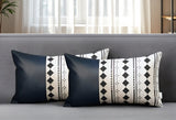 Set of Two 12" X 20" Navy Blue Diamond Fabric and Faux Leather Lumbar Throw Pillows