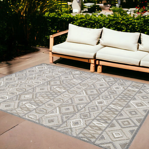 8’ X 10’ Gray Ivory Aztec Pattern Indoor Outdoor Area Rug