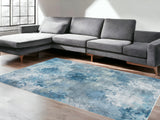 5' X 8' Blue And Ivory Abstract Area Rug