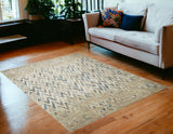5' X 8' Ivory And Blue Chevron Area Rug