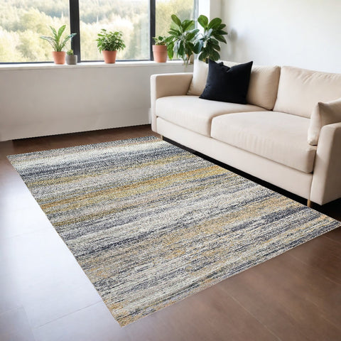 4' X 6' Blue Ivory and Gold Abstract Power Loom Area Rug