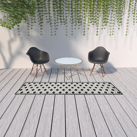 10' Black And White Indoor Outdoor Runner Rug