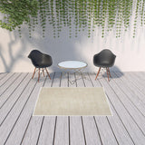 5' X 7' Beige And Ivory Indoor Outdoor Area Rug