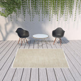 6' X 9' Beige And Ivory Indoor Outdoor Area Rug