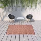 6' X 9' Coral Indoor Outdoor Area Rug