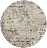 5' X 5' Beige And Grey Round Abstract Power Loom Non Skid Area Rug