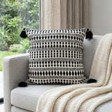22" Black and White Southwestern Cotton Blend Throw Pillow With Tassels
