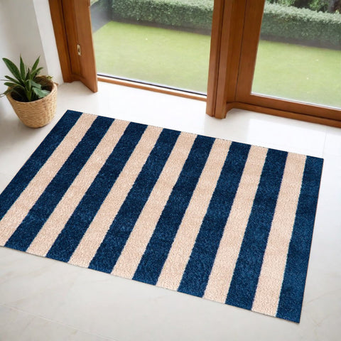 2' X 3' Navy And Sand Striped Tufted Washable Non Skid Area Rug