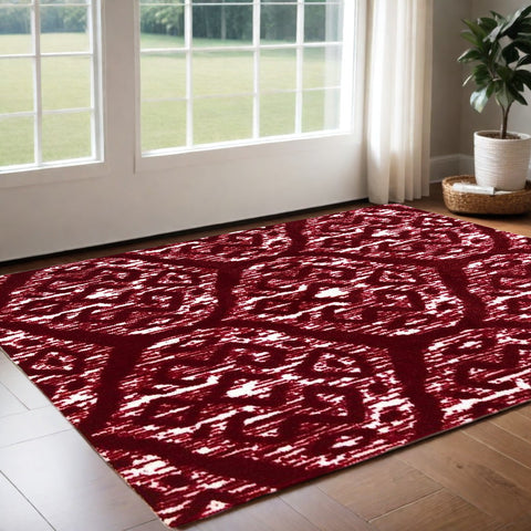 2' X 4' Red And White Ikat Tufted Washable Non Skid Area Rug