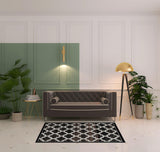 4' X 6' Black Brown And Ivory Geometric Area Rug